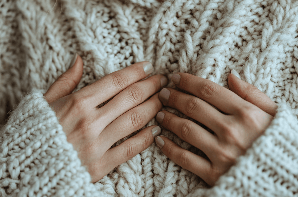 Woman looking inward with a soft expression, symbolizing the quiet shame and self-reflection many women carry in their healing journey.